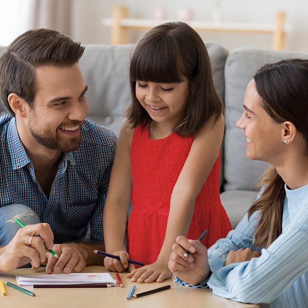 Parents Helping Child with Homework